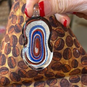 Colorful Glass Pendant with black, royal blue, red, and sparkly silver colors